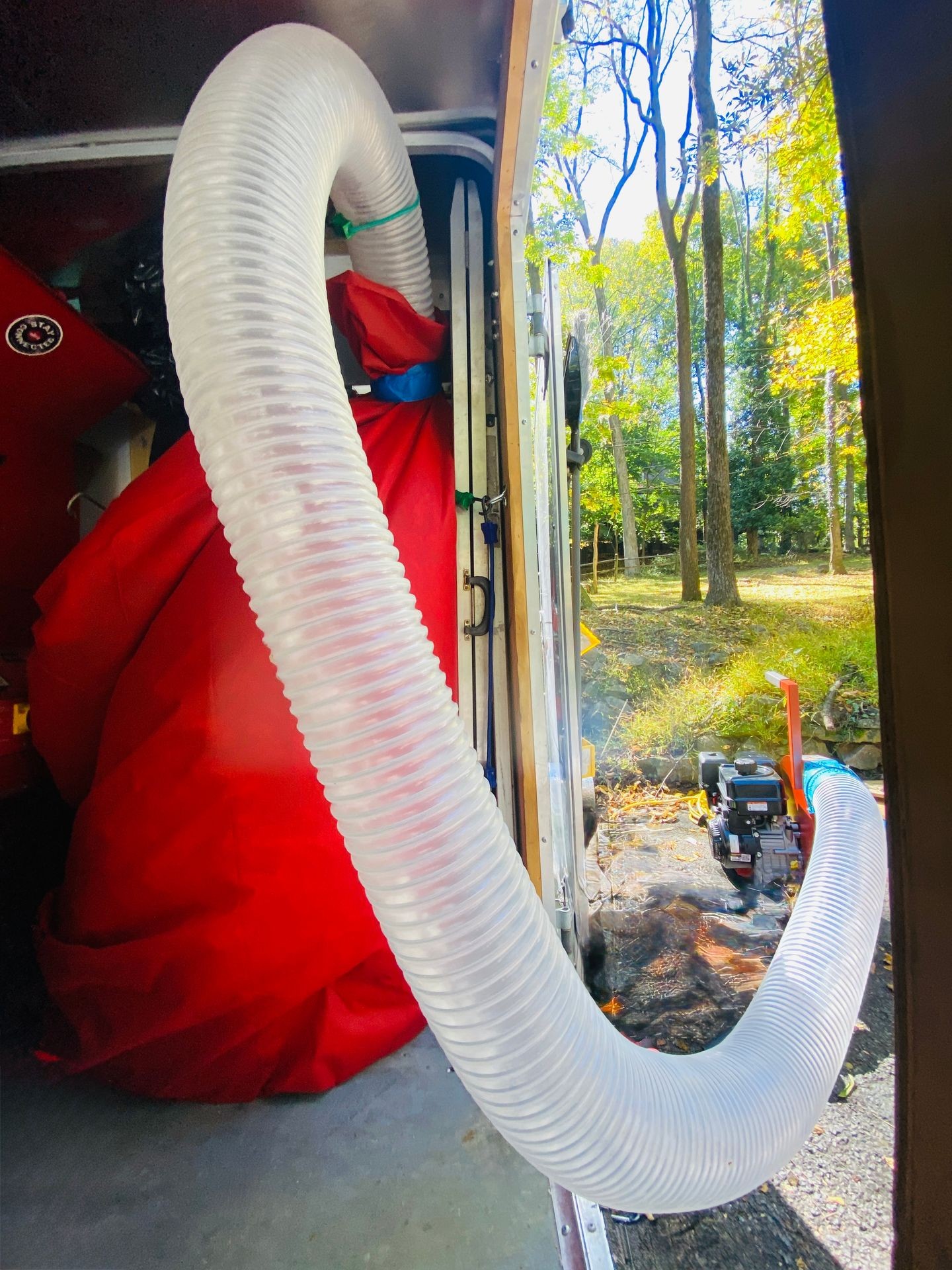Project Probono LLC technician vacuuming out damaged attic insulation in the Lehigh Valley to prepare for air sealing and R‑49 re-insulation—removing contaminated, unsafe, or ineffective materials
