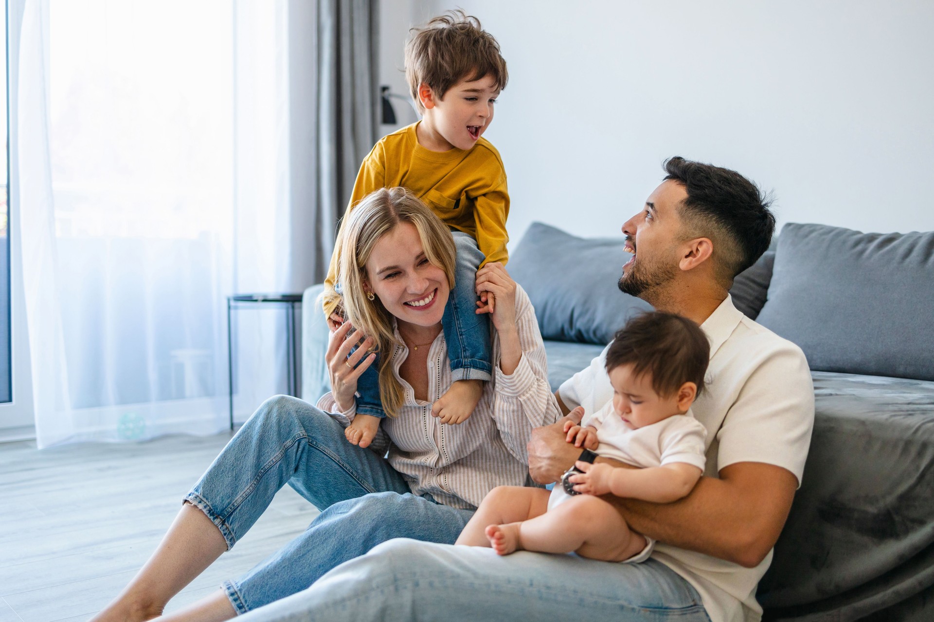 Happy family inside energy-efficient home in Bethlehem, PA after home performance upgrade